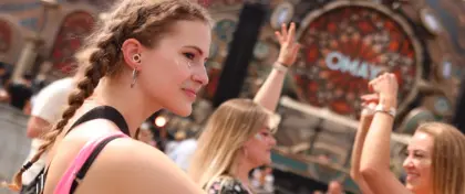 Women in festival with cheer