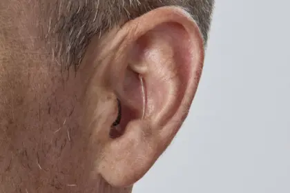 Oticon Zeal nxt CIC H2 2025 Angle F45 Close up In On Ear MS1597 Man