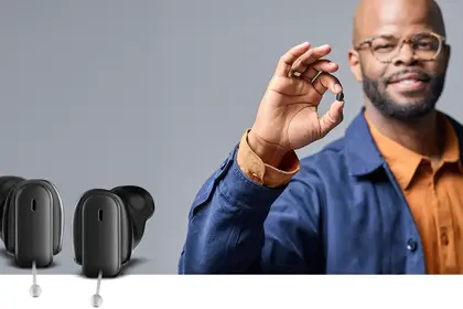 Insio Charge Go CIC IX man holding ha smiling devices 1920x1080